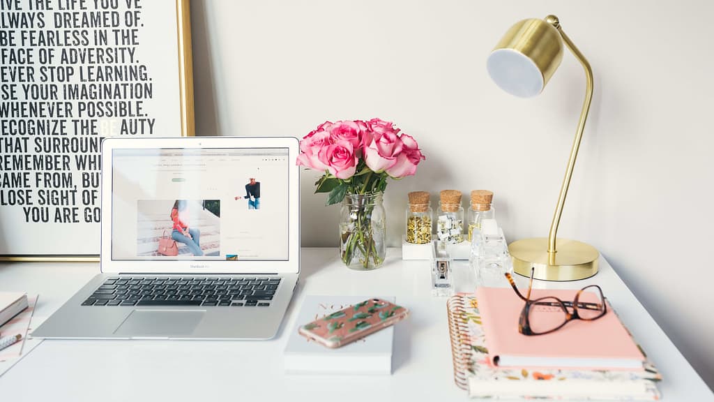 Image: A desk/workspace, well decorated, organized, and decluttered.