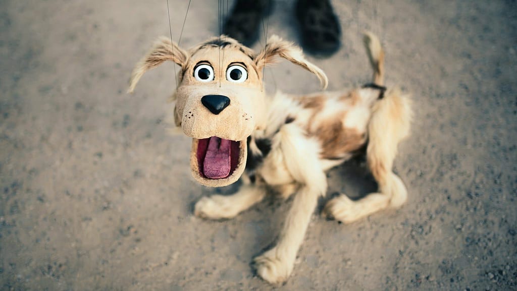 Image: Example of puppetry Dog marionette puppet smiling