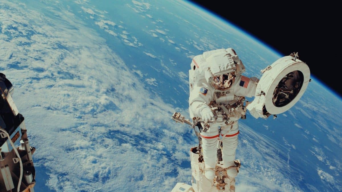 Image: Astronaut Franklin R. Chang-Diaz works with a grapple fixture during extravehicular activity to perform work on the International Space Station