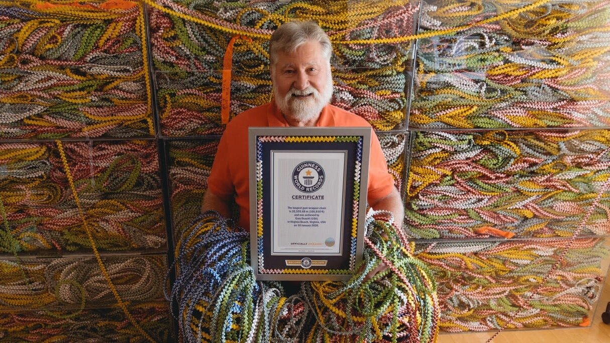 Image: Gary Duschl with his Guinness World Record award and his winning gum wrapper chain!
