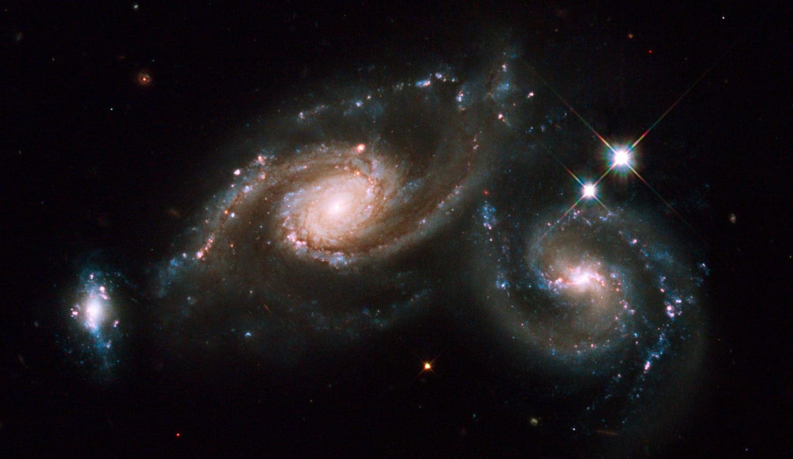 Image: On 1-2 April Hubble's Wide Field Planetary Camera 2 captured Arp 274 (also known as NGC 5679). Arp 274 is a system of three galaxies that appear to be partially overlapping in the image, although they may be at somewhat different distances.