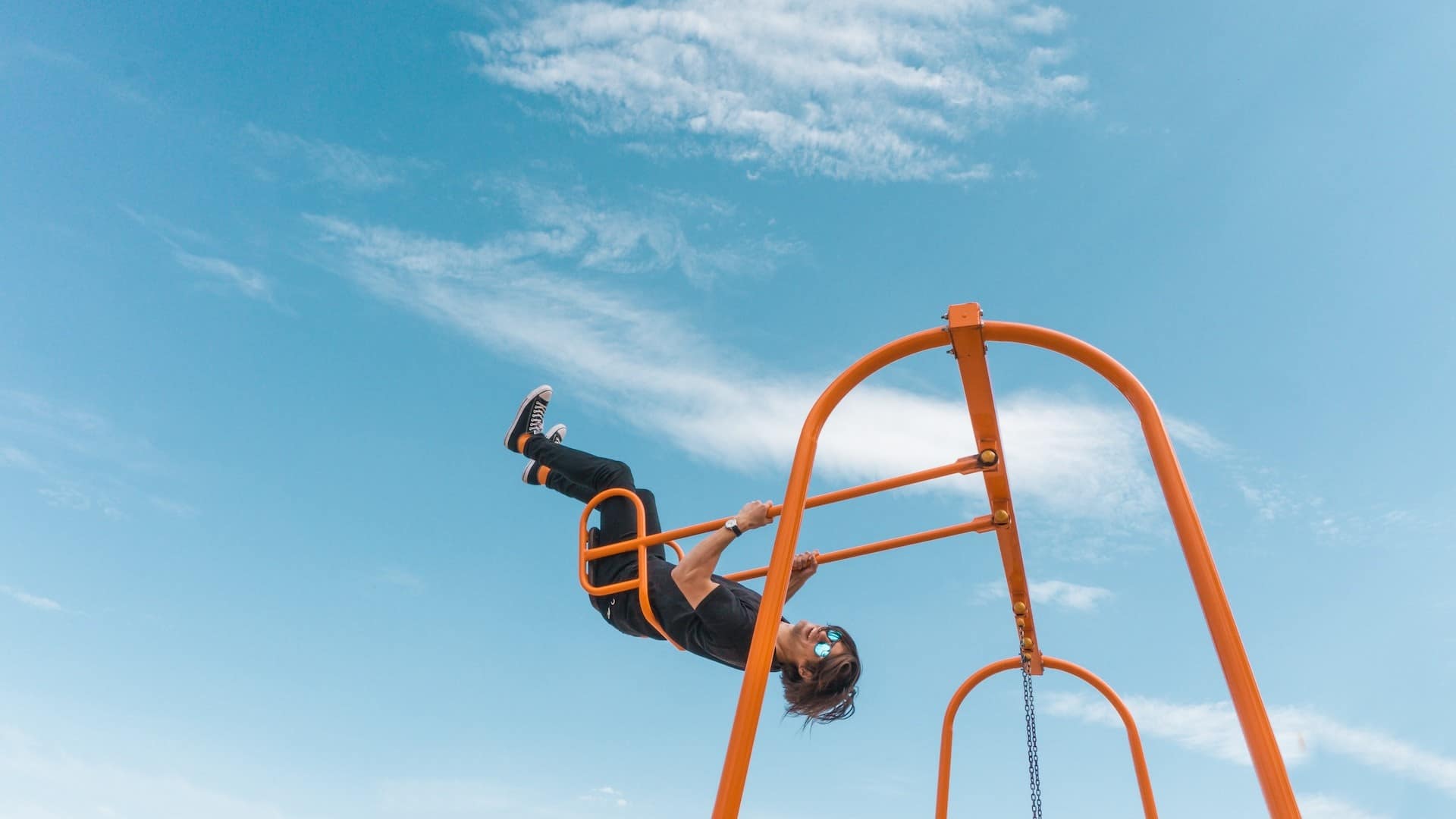 Image: A person on a swing, swinging high. A metaphor for never having felt so good!