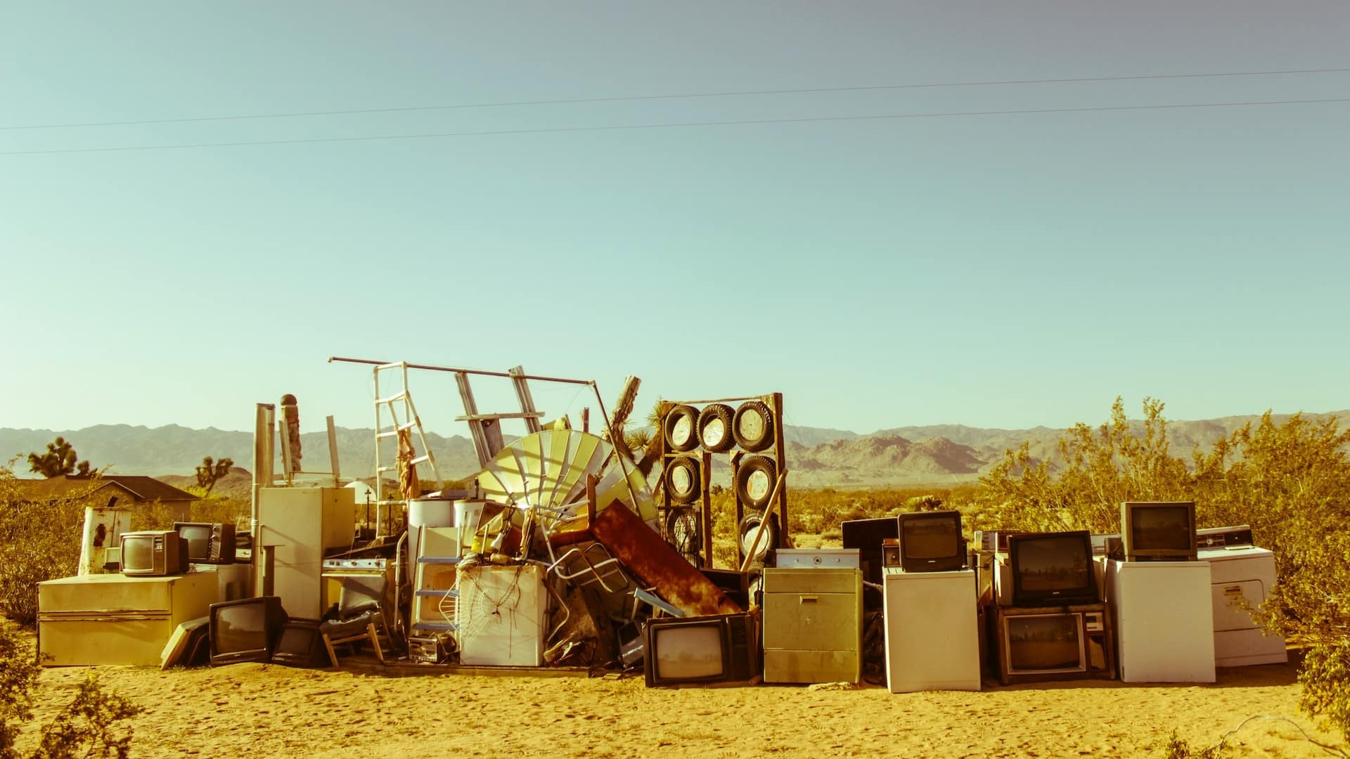 IMAGE: A pile of junk sitting in the outdoors, of which almost anything could be a flute!