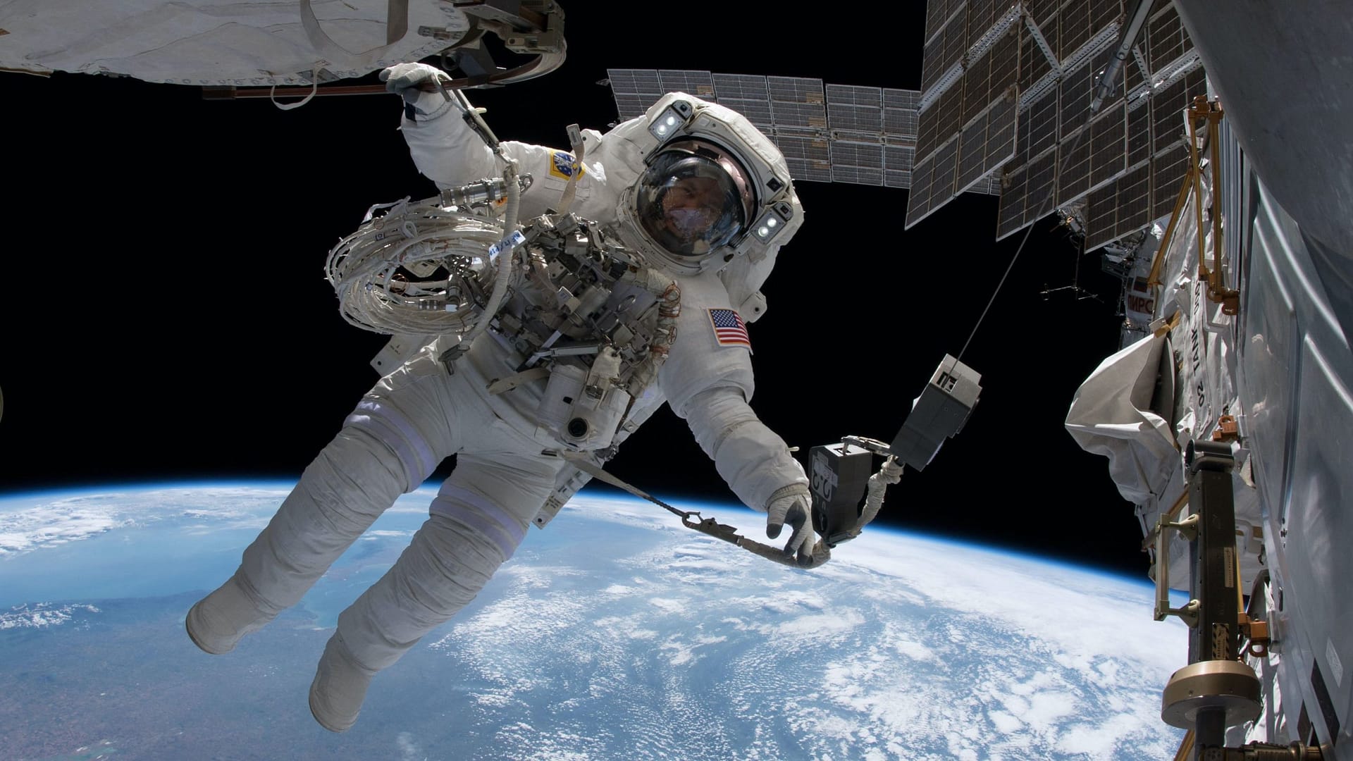 Image: Astronaut on a spacewalk outside of the international space station (ISS)