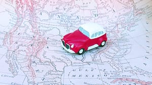 Image: toy car on top of a map of the united states
