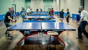 Image: seniors playing ping pong for Parkinson's