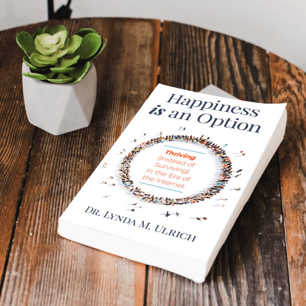 Image: Happiness is an Option sitting on a nightstand