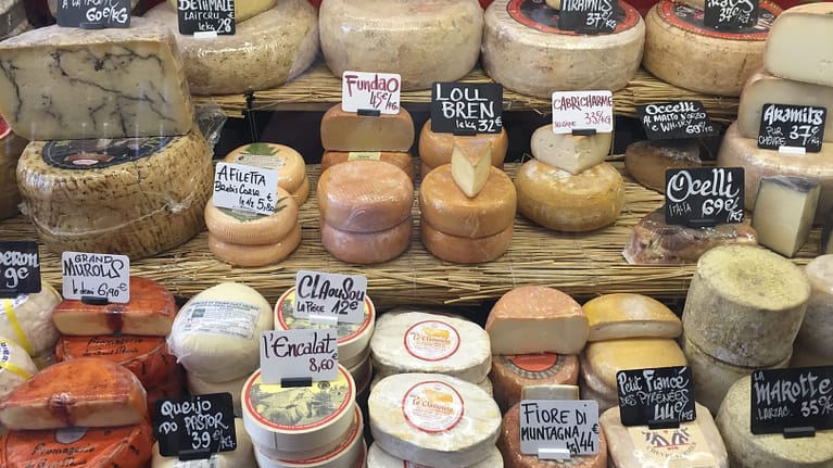 Image: variety of cheese at a market!