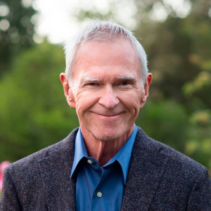 Author Gay hendricks smiles at the camera
