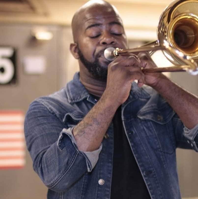 Image: Benny playing his trombone. 