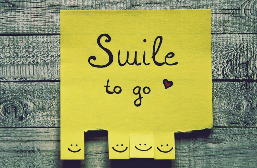 Image: Sticky notes with smiley face pull tabs