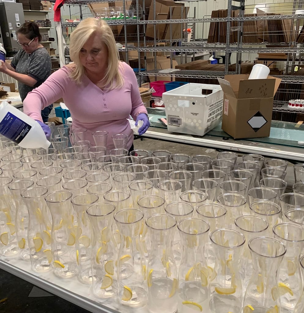 Image: Brenda Chapman of Just Dough It pouring fake drinks