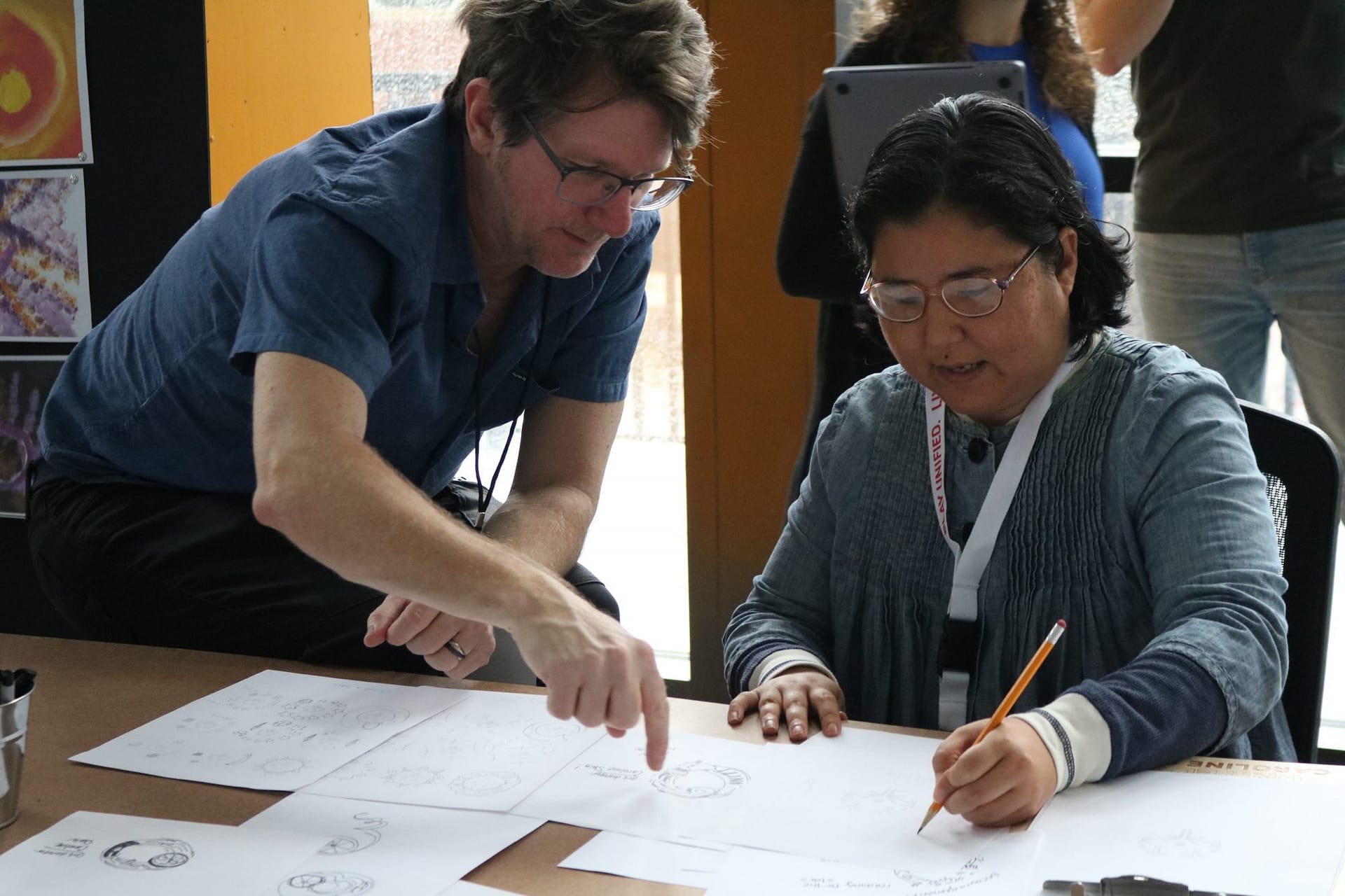 Image: Special Olympics athlete working on the United O logo collaboration