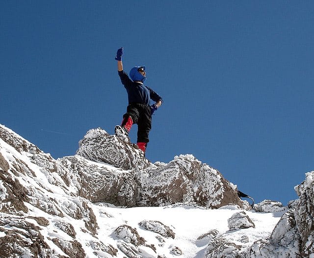Image: Sherpa on top of Mt. Everest