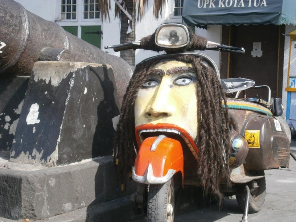 Image: Vespa decorated to look like it has dreadlocks