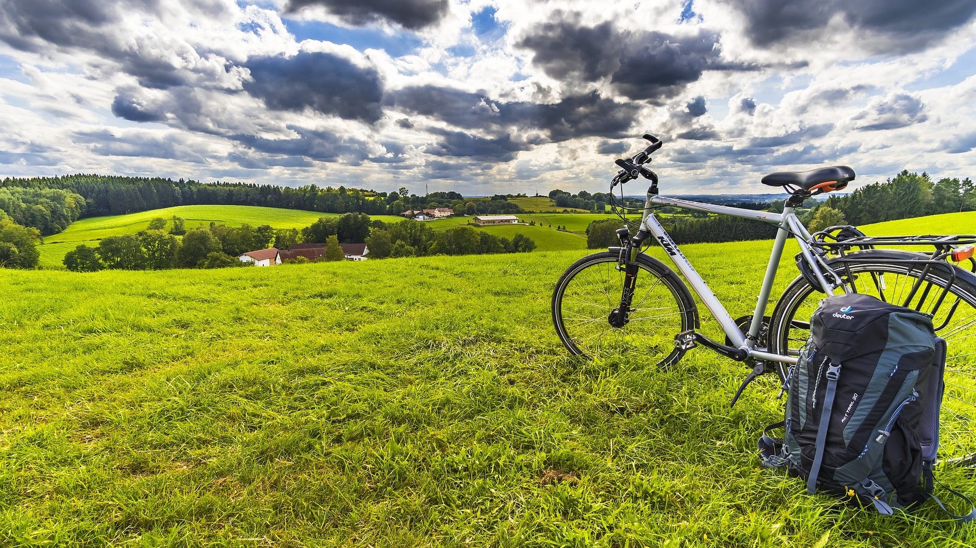 Image: A photo of a bicycle overlooking a glorious field