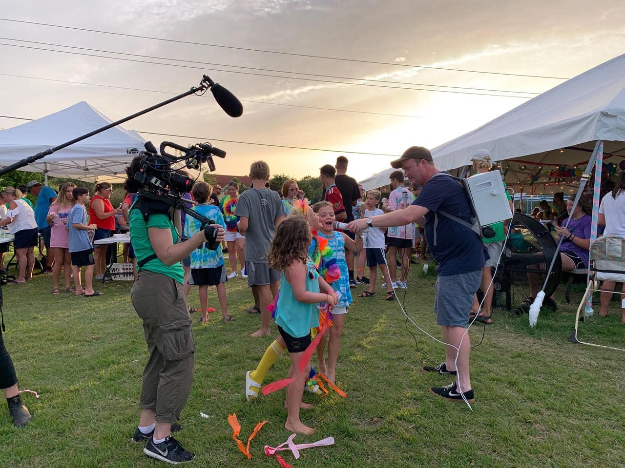 Image: Brad using his karaoke backpack at Lighthouse Retreat