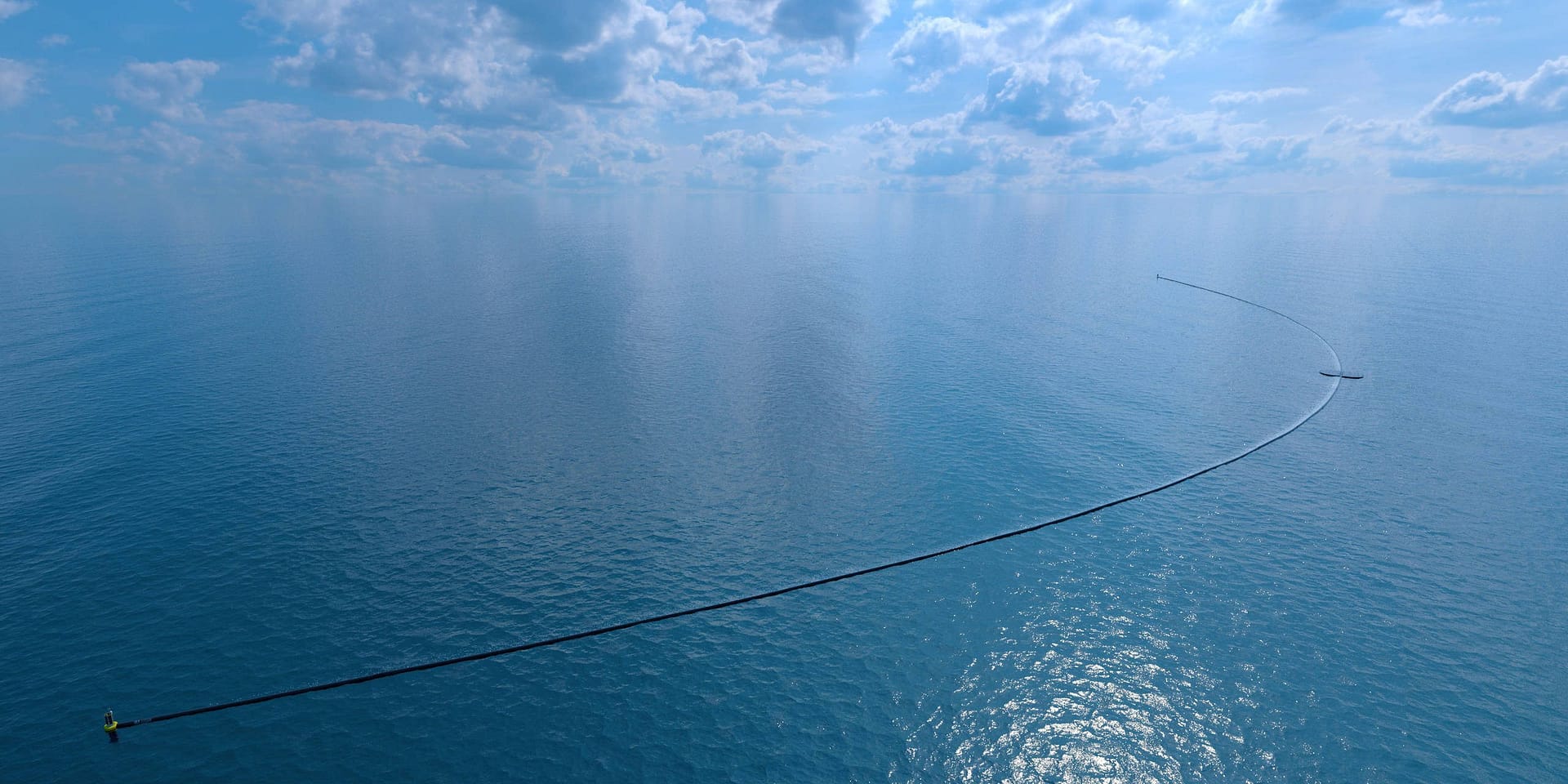 Image: Artists rendering of the Ocean Cleanup booms from the air