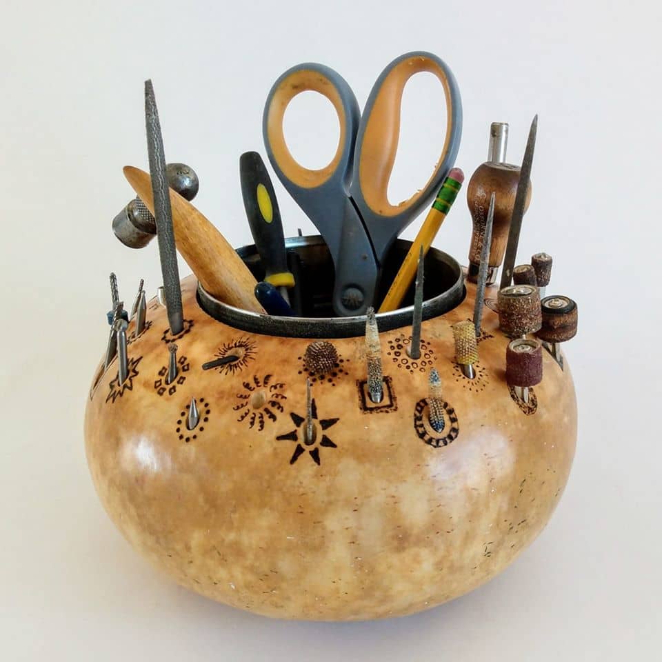 Image: A drill bit and tool holder created out of a gourd!