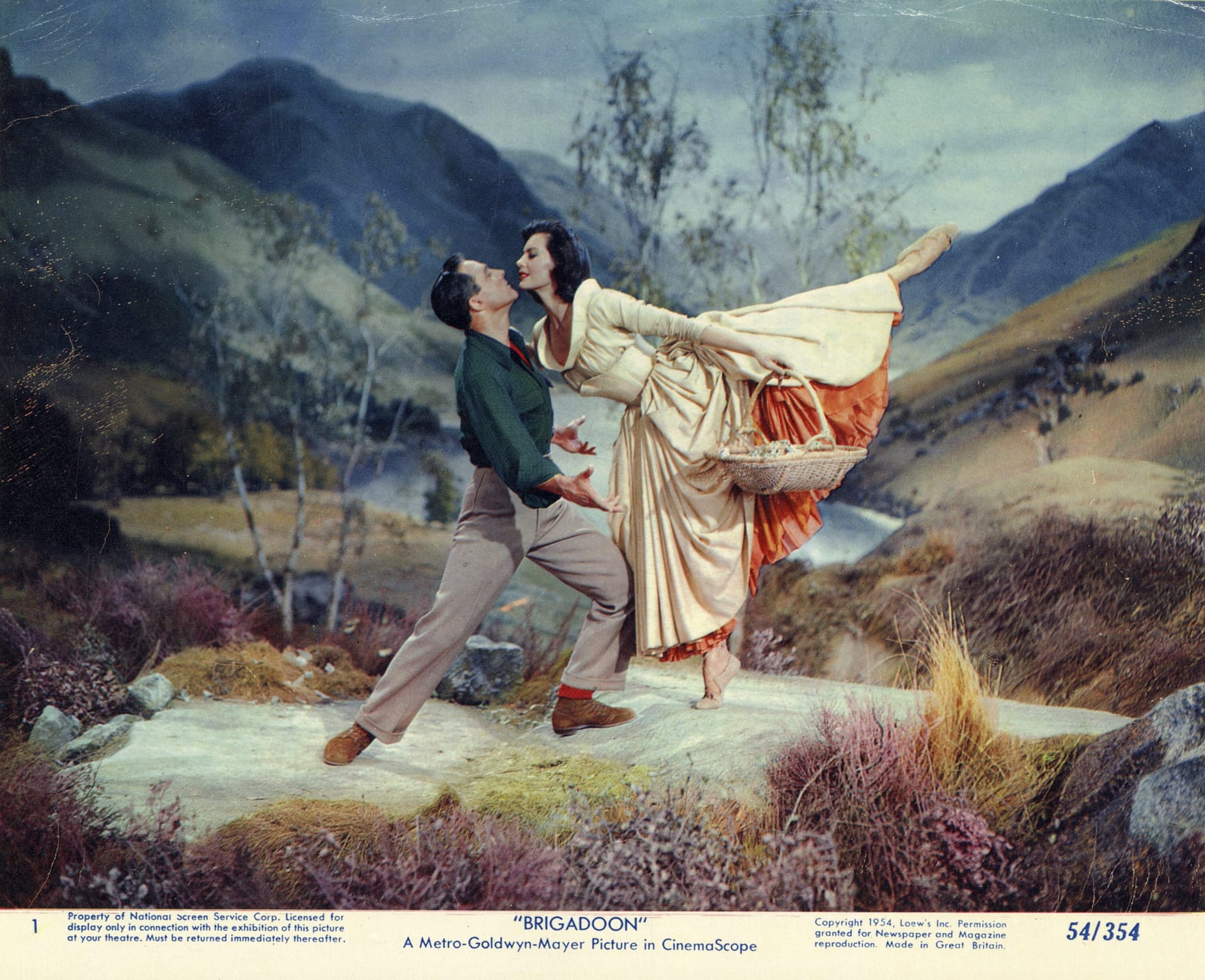 Image: Gene Kelly and Cyd Charisse dancing together in the old Hollywood film Brigadoon
