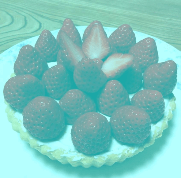Image: illusion of strawberries appearing to be red but they are actually grey