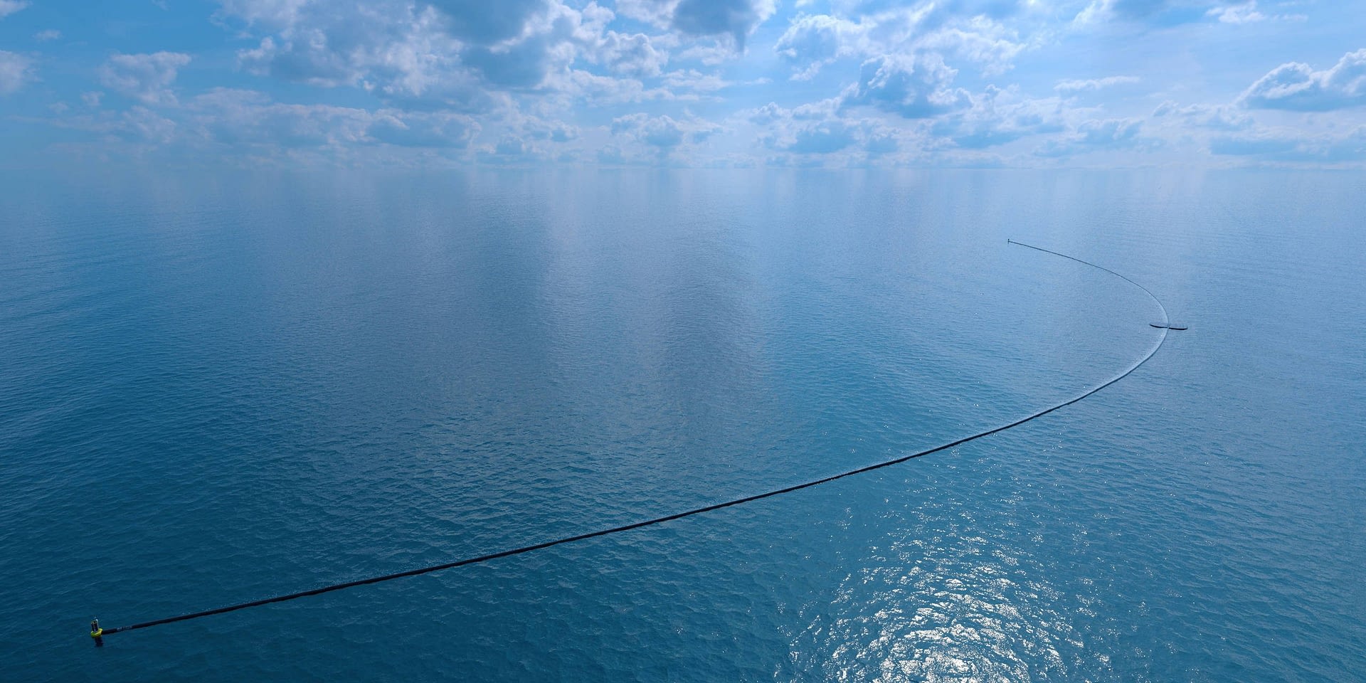 Image: Artists rendering of the Ocean Cleanup booms from the air