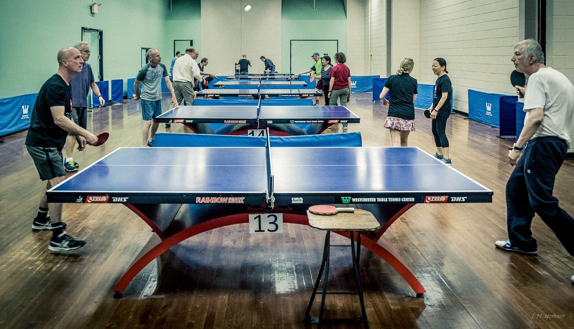 Image: seniors playing ping pong for Parkinson's