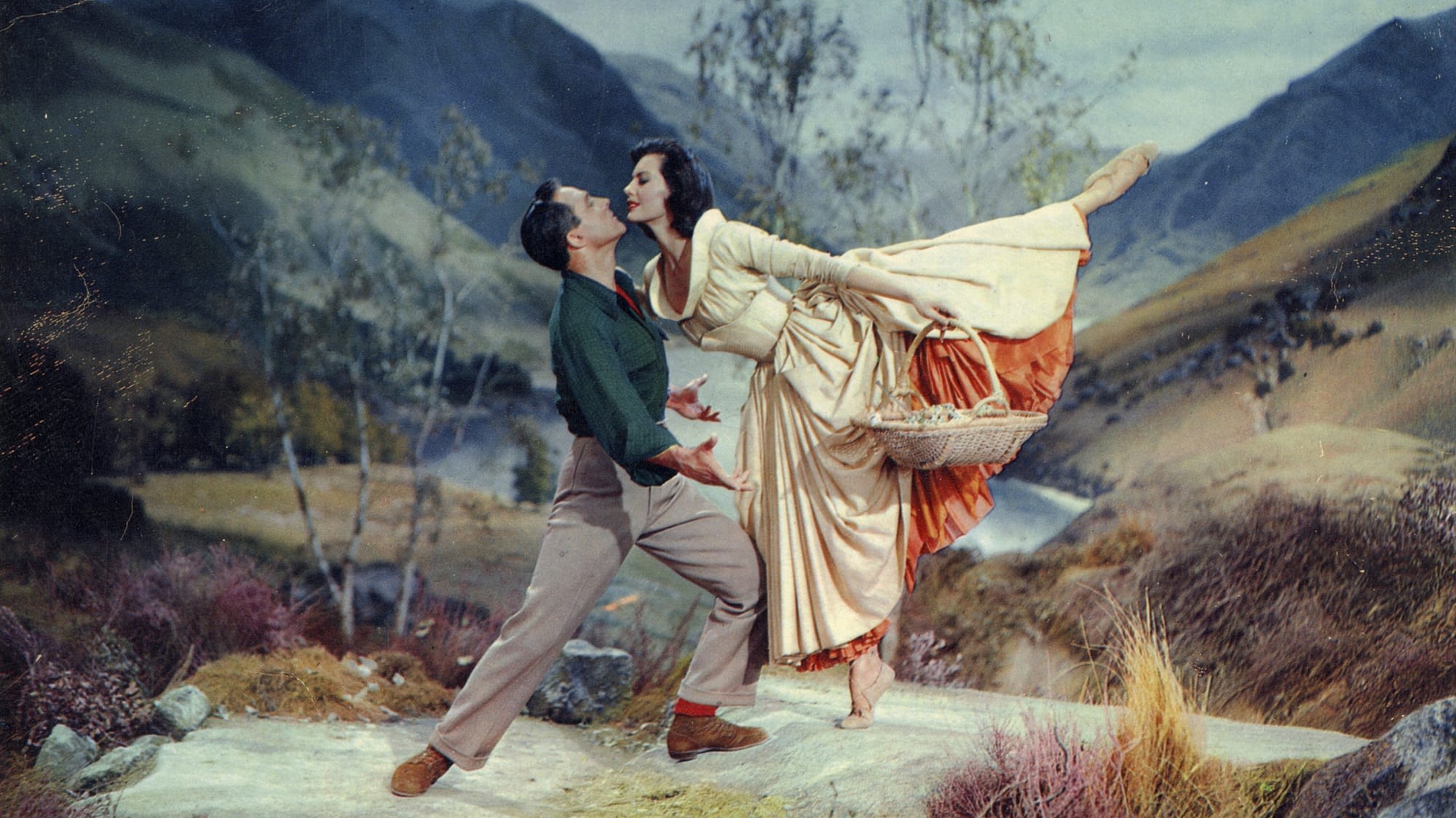 Image: Gene Kelly and Cyd Charisse dancing together in the film Brigadoon