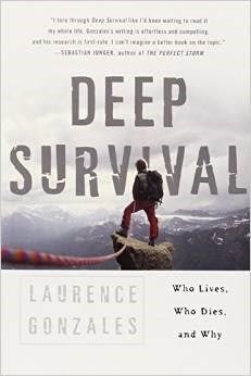 Image: The cover of "Deep Survival" by Laurence Gonzales. A picture of a man on top of a cliff. "Who Lives, Who Dies, and Why"
