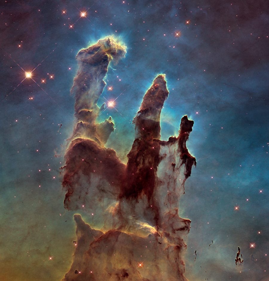 Image: These towering tendrils of cosmic dust and gas sit at the heart of M16, or the Eagle Nebula. The aptly named Pillars of Creation, featured in this stunning Hubble image, are part of an active star-forming region within the nebula and hide newborn stars in their wispy columns.